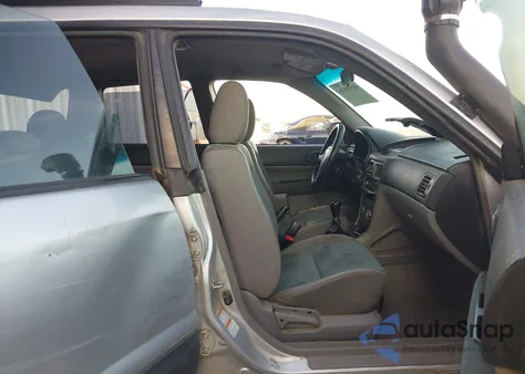 2005 Subaru Forester 2.5X z USA, uszkodzony, nr VIN JF1SG63655G722057